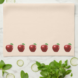 Linge De Cuisine De beaux pommes rouges sur beige clair