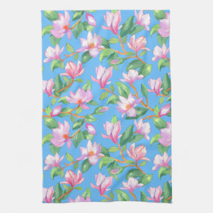 Linge De Cuisine Magnolia en floraison sur le bleu ciel
