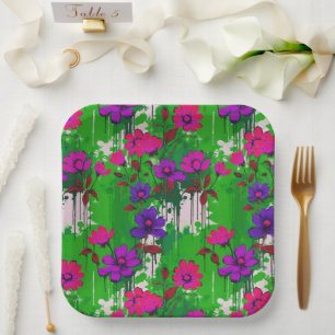 Linke grüne Tropffarbe und rosa und violette Blume Pappteller