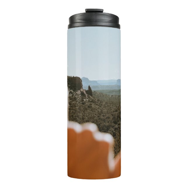 Links menschliche Hand Thermosbecher (Vorderseite)