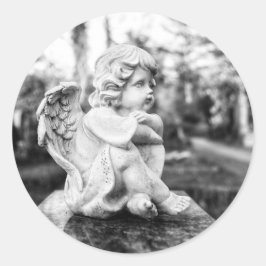 Little angel sitting watching the horizon runder aufkleber