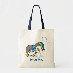 Little penguin getting a snow ball tote bag tragetasche