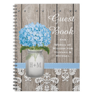 Livre d'invité bleu décoré d'un monogramme