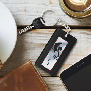 Logo tribal noir audacieux dragon fleurs rouges bl