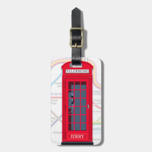 Londoner Telefonzelle mit Hintergrund der U-Bahn-K Gepäckanhänger