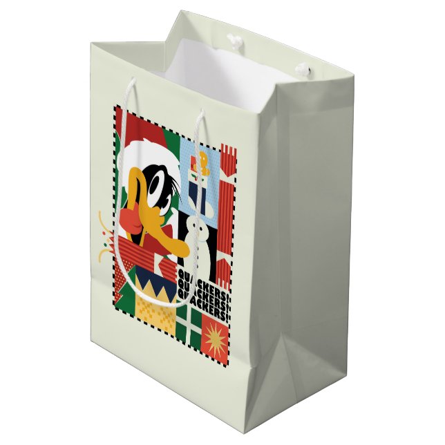 LOONEY TUNES™ DAFFY DUCK™ Holiday Quacker Mittlere Geschenktüte (Vorderseite Schrägansicht)