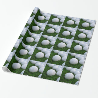Lose Golfbälle auf dem Gras Geschenkpapier