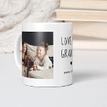 Love You Grandma | Two Photo Handwritten Text Kaffeetasse<br><div class="desc">This simple and stylish black and white mug says "Love you Grandma" in trendy,  handwritten black text with a matching heart and a spot for your name. There is also room to show off two of your favorite personal photos for a gift your grandmother will love.</div>