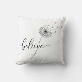 Löwenzahnkeimlinge mit dem Text 'Glaube' Kissen