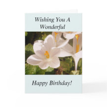 Lumière de fleur blanche et carte d'anniversaire