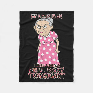Lustige alte Dame braucht neue Körpertransplantati Fleecedecke