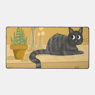 Lustige Katze auf Schreibtisch mit Pflanzen Schreibtischunterlage