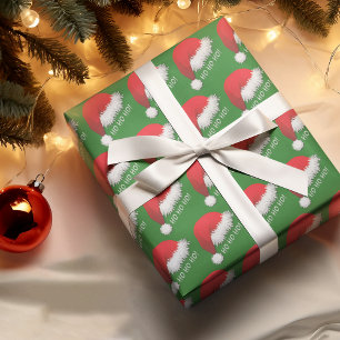 Lustige rote Weihnachtsmannmütze HOHOHO auf Grün Geschenkpapier