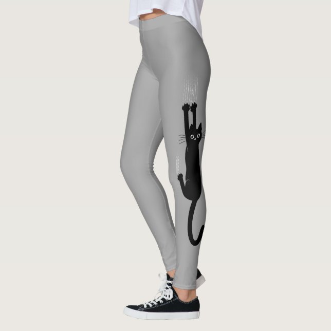 Lustige schwarze Katze, die an der Neuheit des | Leggings (Links)