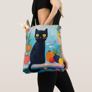 Lustige schwarze Katze mit buntem frischem Obst Tasche