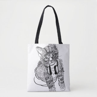 Lustige schwarze u. weiße Katze in der Tasche