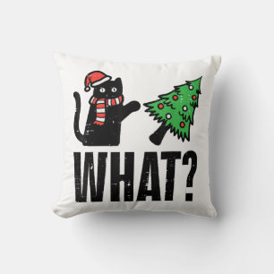 Lustige Weihnachtskatze kippt Weihnachtsbaum Kissen