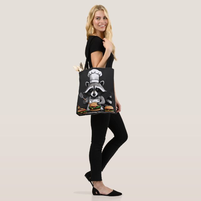 Lustiger BBQ-Waschbär dreht Burger um  Tasche (Am Model)