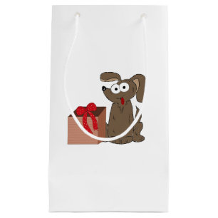 Lustiger Cartoon-Hund mit Geschenk Kleine Geschenktüte