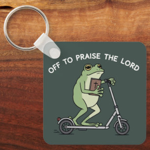 Lustiger christlicher Frosch, um den Herrn Bibel z Schlüsselanhänger