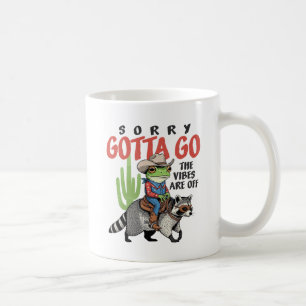 Lustiger Cowboy-Frosch reitet auf Waschbär "Die St Kaffeetasse