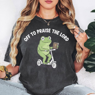 Lustiger Frosch fährt mit dem Roller mit Bibel T-Shirt