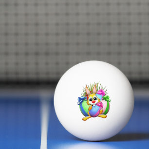 Lustiger Hase beißt in ein Osterei Tischtennisball
