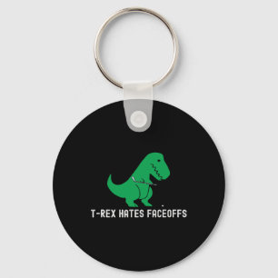 Lustiger Hockey-Dinosaurier T-Rex hasst Faceoffs L Schlüsselanhänger