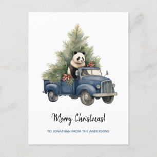 Lustiger Panda in blauem Retro-LKW Weihnachten