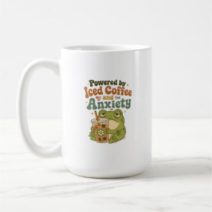 Lustiger Retro-Frosch, angetrieben von Eiskaffee u Kaffeetasse