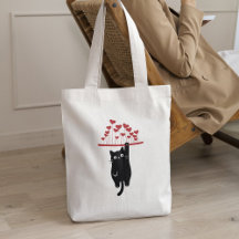 Lustiger schwarzer Kater, der am Valentinstag abhä