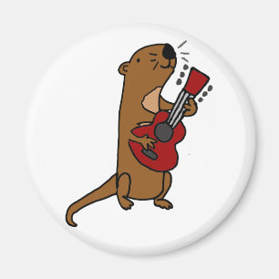 Lustiger Seeotter, der Gitarre spielt Magnet
