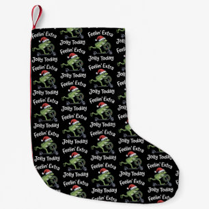 Lustiger Weihnachtsfrosch fühlt sich heute besonde Kleiner Weihnachtsstrumpf