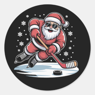 Lustiger Weihnachtsmann spielt Eishockey Xmas  Runder Aufkleber