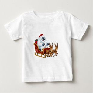 Lustiger Yeti, der einen Weihnachtsschlitten fährt Baby T-shirt