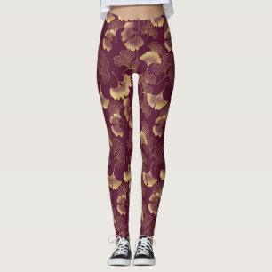 Luxuriöse goldene Ginkgoblätter auf tiefem Burgund Leggings