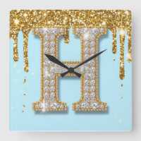 Luxus-Diamant-Buchstabe H auf goldenem Glitter-Hin
