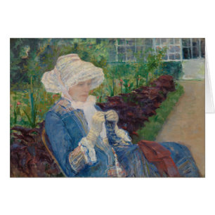 Lydia faisant du crochet dans le jardin à marneux