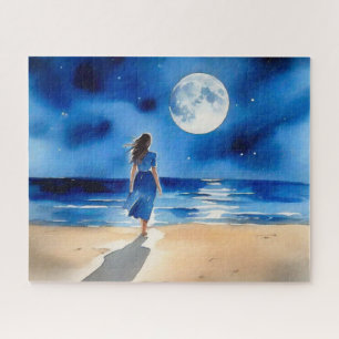 Mädchen am Strand unter einem Vollmond