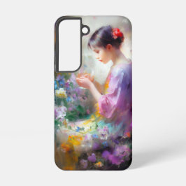 Mädchen bewundert eine Blume in ihren Händen Samsung Galaxy Hülle