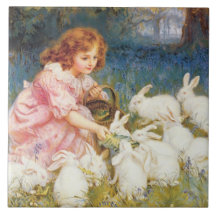 Mädchen, das die Kaninchen Füttre (von Frederick M