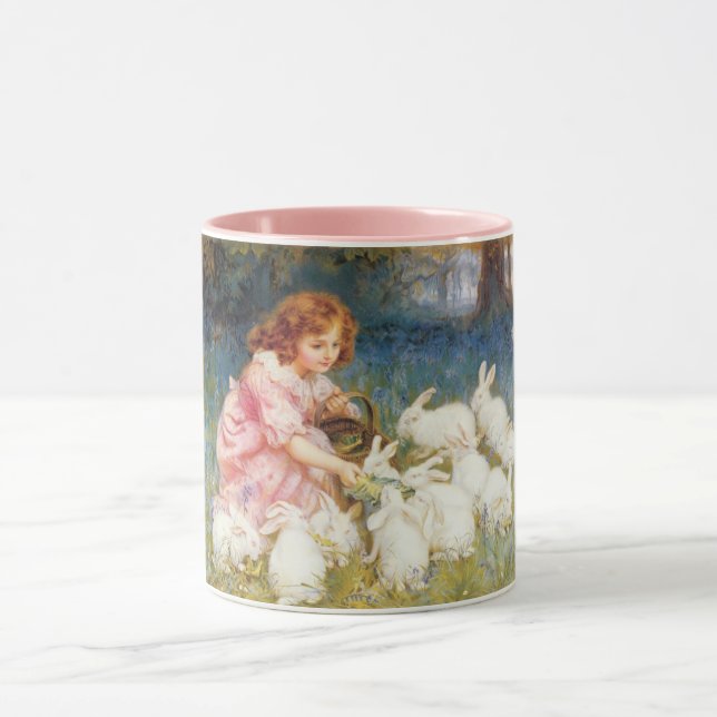 Mädchen, das die Kaninchen Füttre (von Frederick M Tasse (Zentrum)