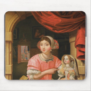 Mädchen, das eine Puppe in einem Innenraum hält Mousepad