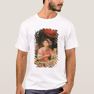Mädchen, das eine Puppe in einem Innenraum hält T-Shirt