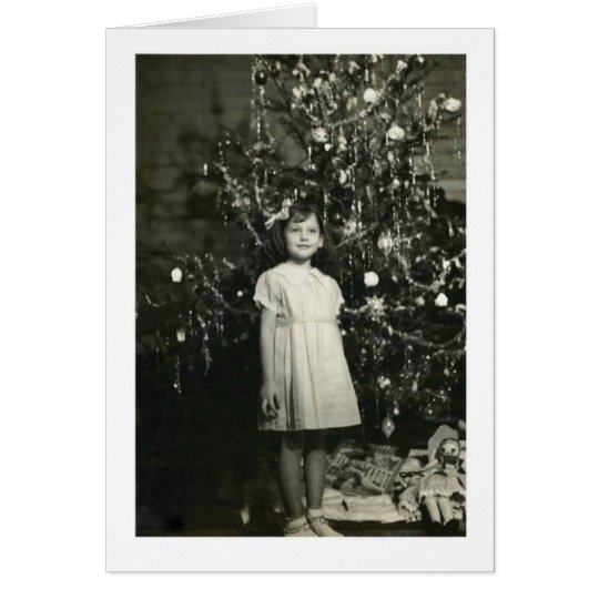 MÄDCHEN DURCH EINE WEIHNACHTSBAUM-KARTE KARTE