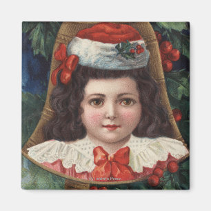 Mädchen in der Weihnachtsmannmütze in Bell Magnet