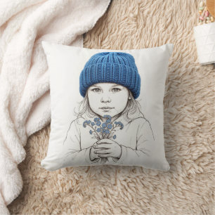 Mädchen in einer blauen Strickmütze Kissen