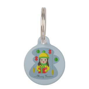 Mädchen mit Weihnachts-Geschenkboxen Haustiermarke