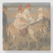 Mädchen reiten Donkeys am Strand