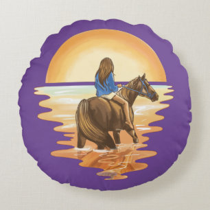 Mädchen reitet Pferd bei Sonnenuntergang Rundes Kissen